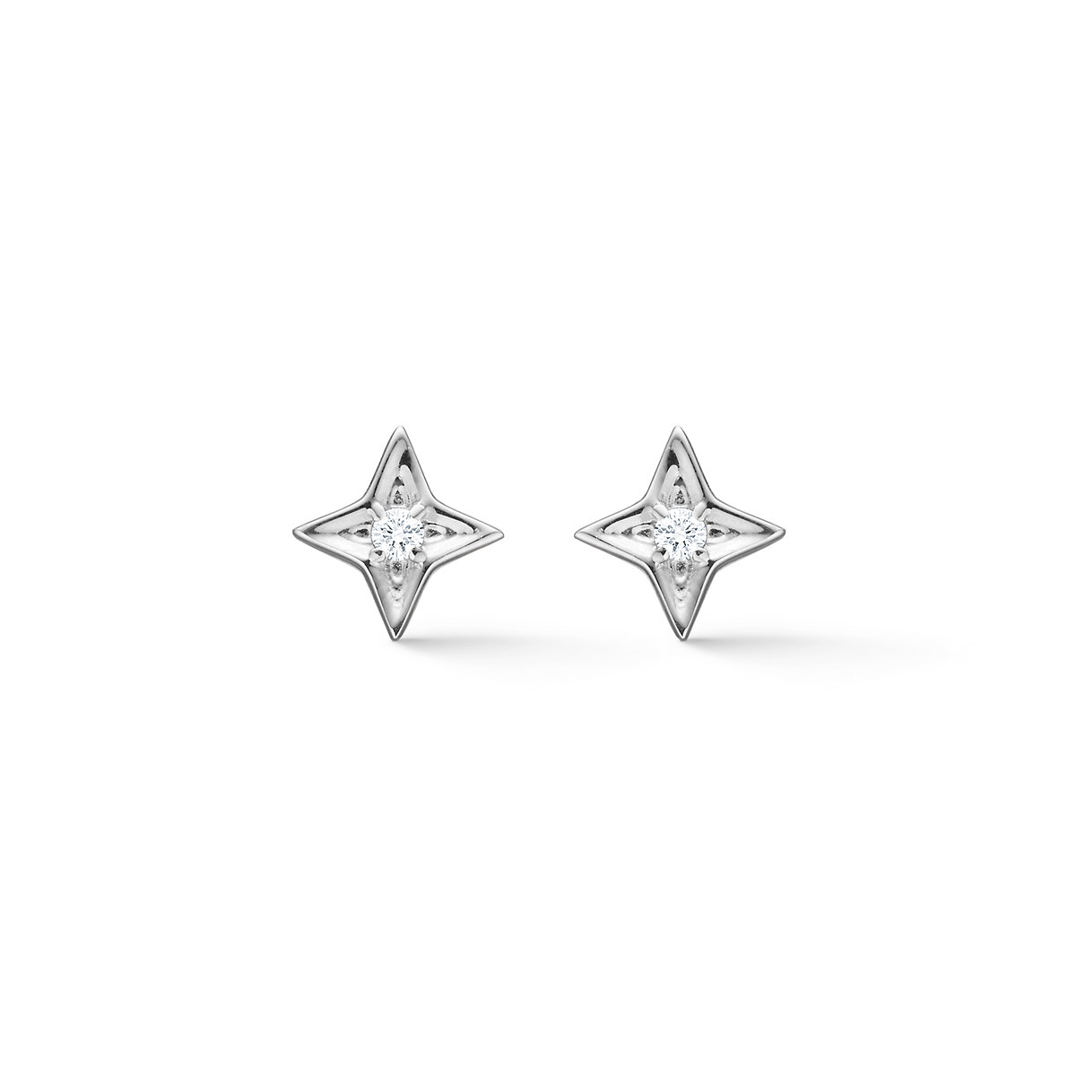 Mads Z Vesper silver studs with topaz shown as star-shaped silver earrings with clear stone, Model 2116197-1.