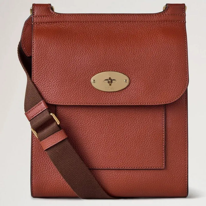 Mulberry Antony Rust Small Classic Grain crossbody bag in rust-colored leather with gold buckle. Model HH4645205L190.