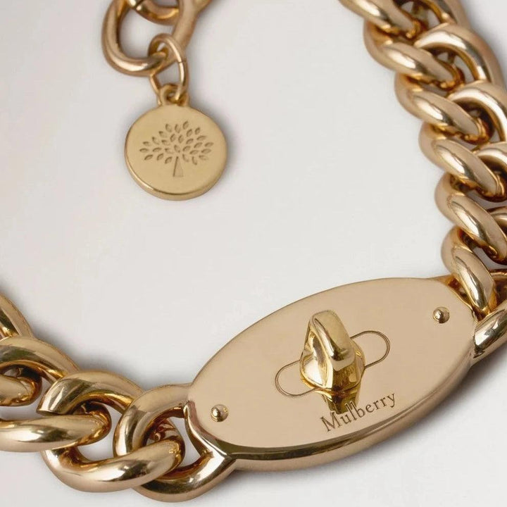 Mulberry Bayswater Chunky Chain Necklace shows a close-up of necklace in gold-tone metal, Model qn2355000p140.