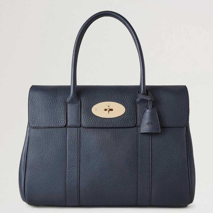 Mulberry Bayswater Heavy Grain Night Sky handbag in dark blue leather with gold-coloured clasp. Model HH6592736U888