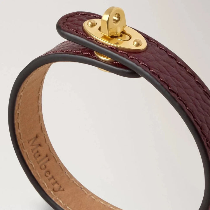 Mulberry Bayswater Thin Bracelet Black Cherry in embossed dark red leather with golden buckle. Model QB2390205K560