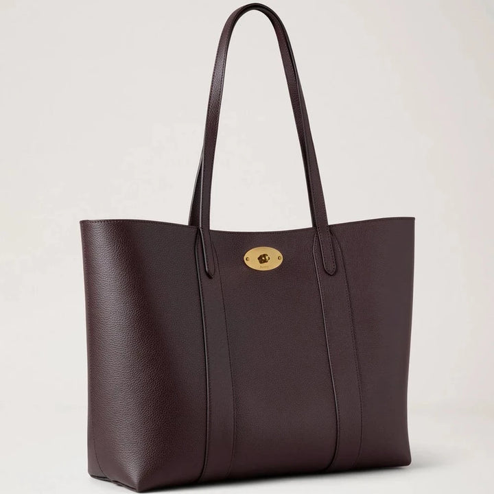 Mulberry Bayswater Tote Ebony Small Classic Grain features a dark brown leather bag with a gold-tone clasp. Model HH5727205A110
