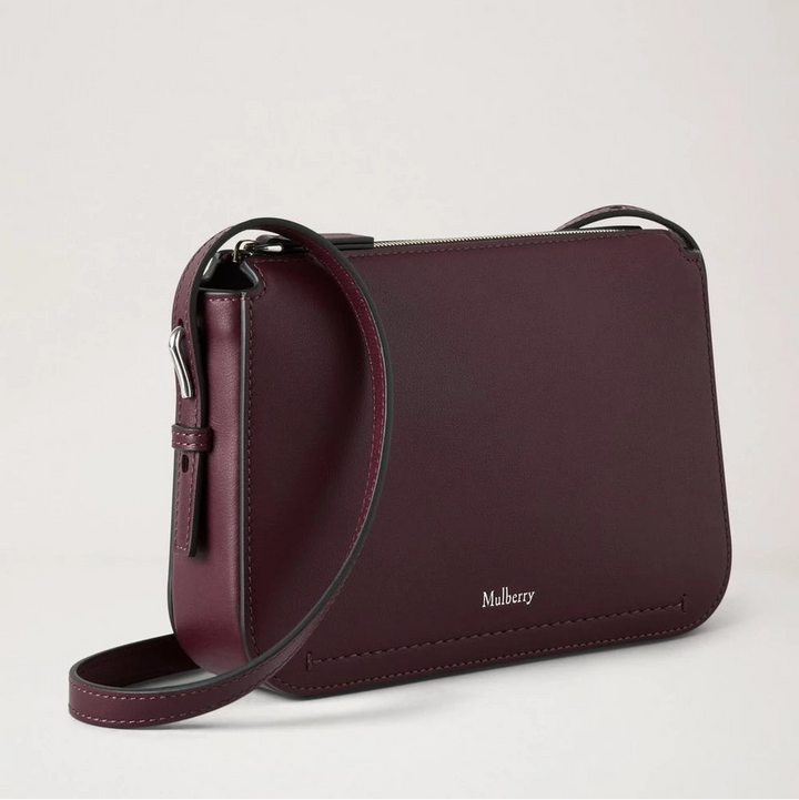 Mulberry Clovelly Pouch Black Cherry Micro Classic Grain shows an elegant dark red leather pouch with adjustable strap. Model RL8729587K560.