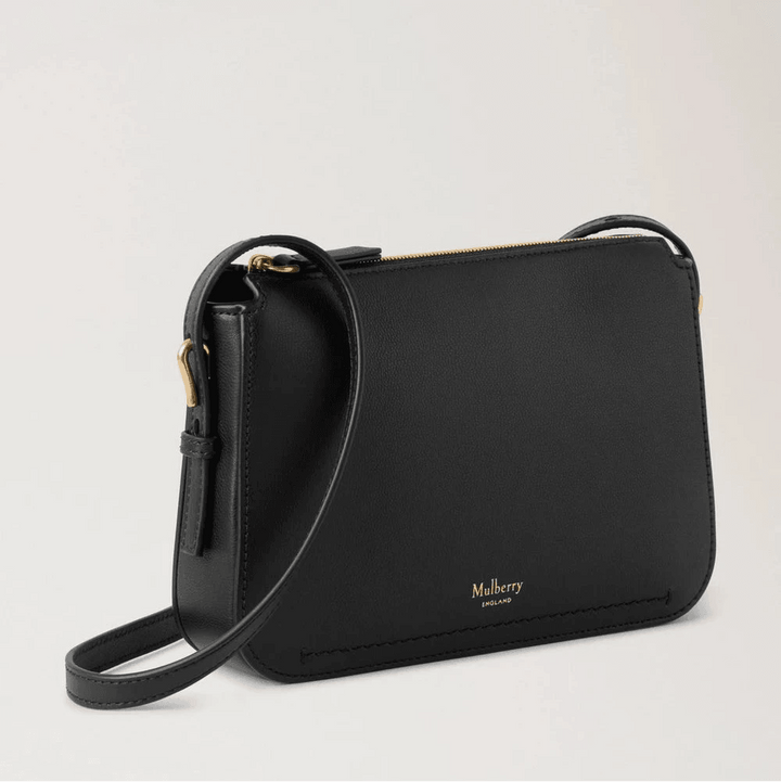 Mulberry Clovelly Pouch Micro Classic Grain Black shows an elegant black leather clutch with adjustable strap, Model RL8729587A100.