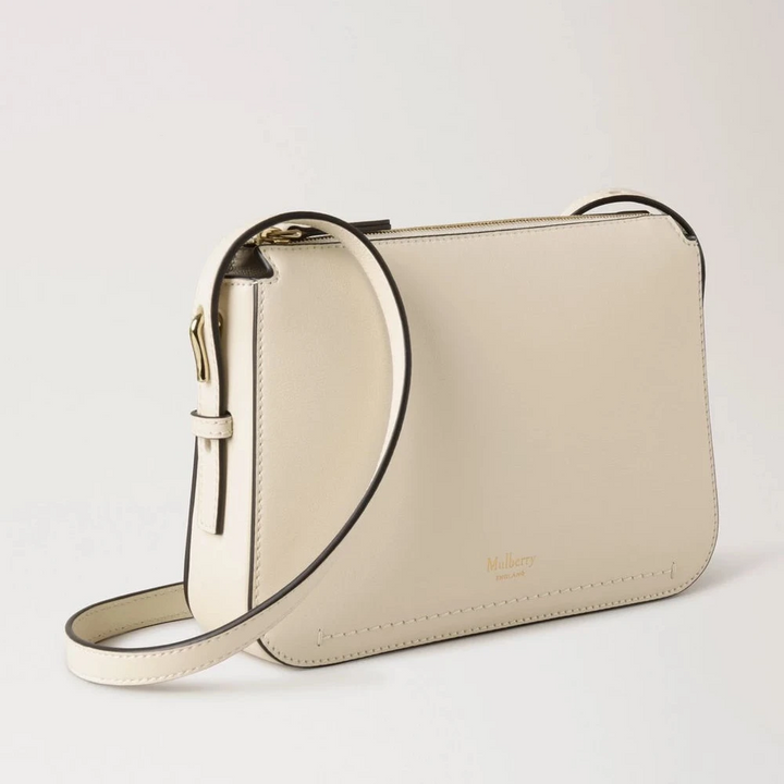 Mulberry Clovelly Pouch Micro Classic Grain Eggshell, small cream white leather bag with adjustable strap. Model RL8729587H687.