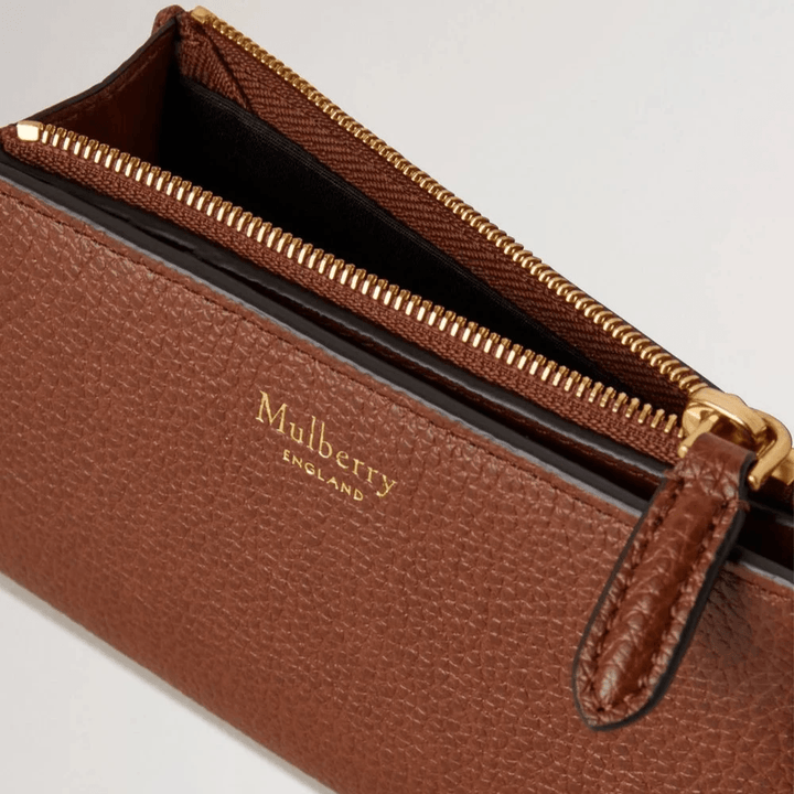 Mulberry Continental Bifold Zipped Wallet Oak Two Tone Small Classic Grain seen close up, brown leather wallet with gold details. Model RL8282552G110.