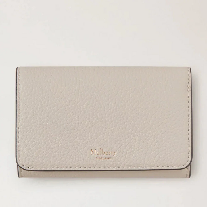 Mulberry Continental Trifold Chalk Small Classic Grain, front view of beige leather wallet with discreet logo. Model RL6824/205W160