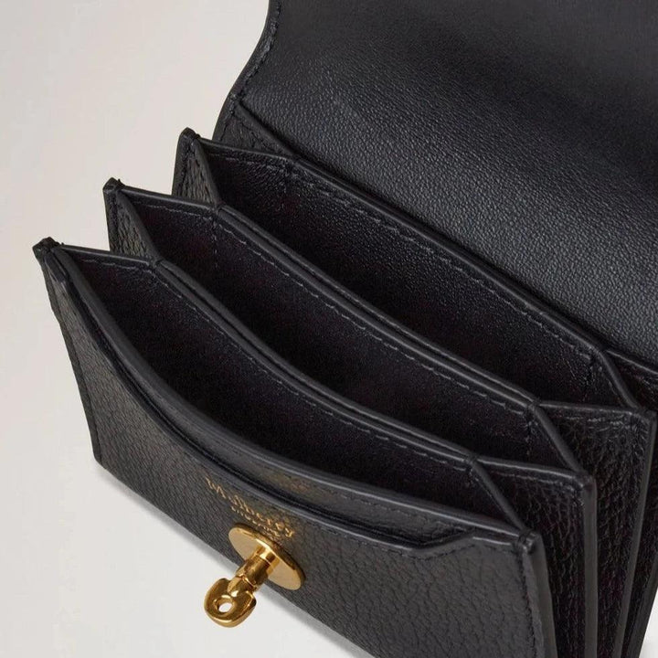 Mulberry Darley Concertina Wallet Small Classic Grain Black showcases spacious black leather interior with golden details. Model RL8064205A100.