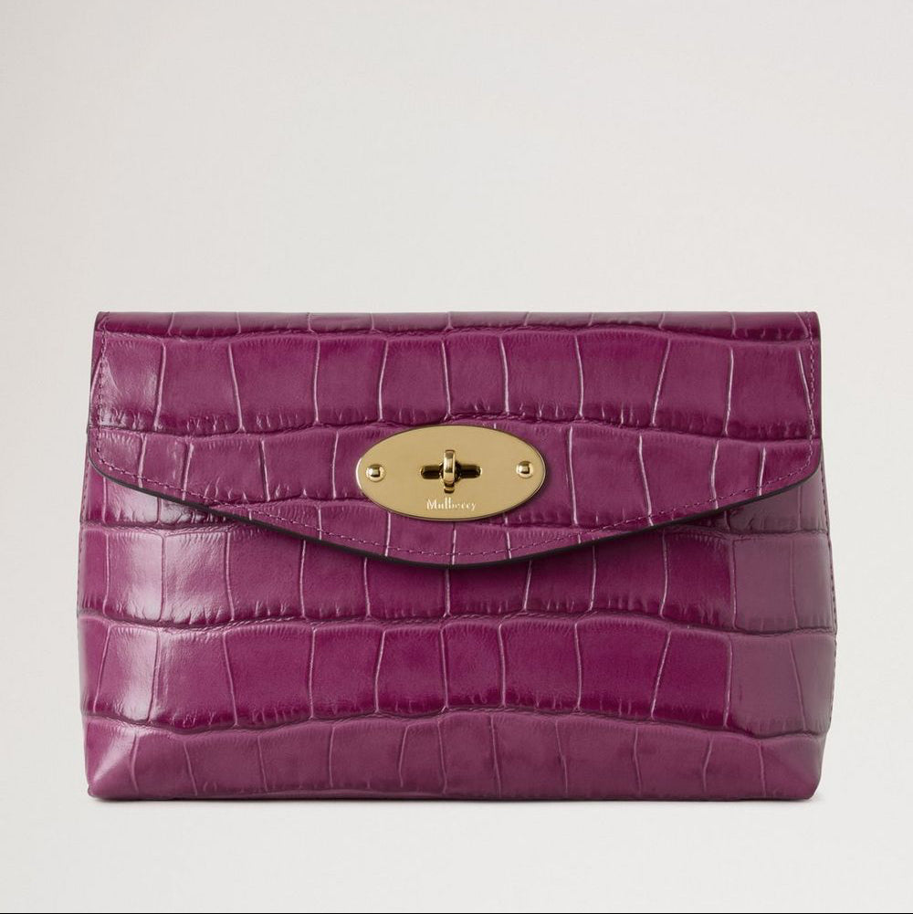 Mulberry Darley Cosmetic Pouch Orchid Bloom Shiny Small Croc is shown in purple glossy croc leather with golden buckle. Model RL8187641J512