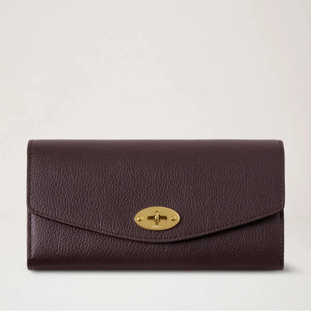 Mulberry Darley Wallet Small Classic Grain Ebony features a brown embossed leather wallet with a gold-tone buckle. Model RL4868205A110