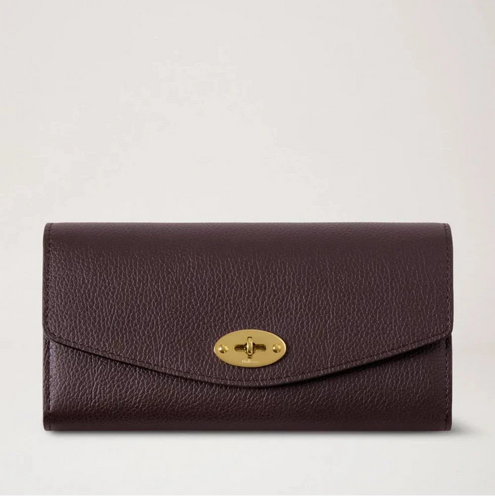 Mulberry Darley Wallet Small Classic Grain Ebony features a brown embossed leather wallet with a gold-tone buckle. Model RL4868205A110