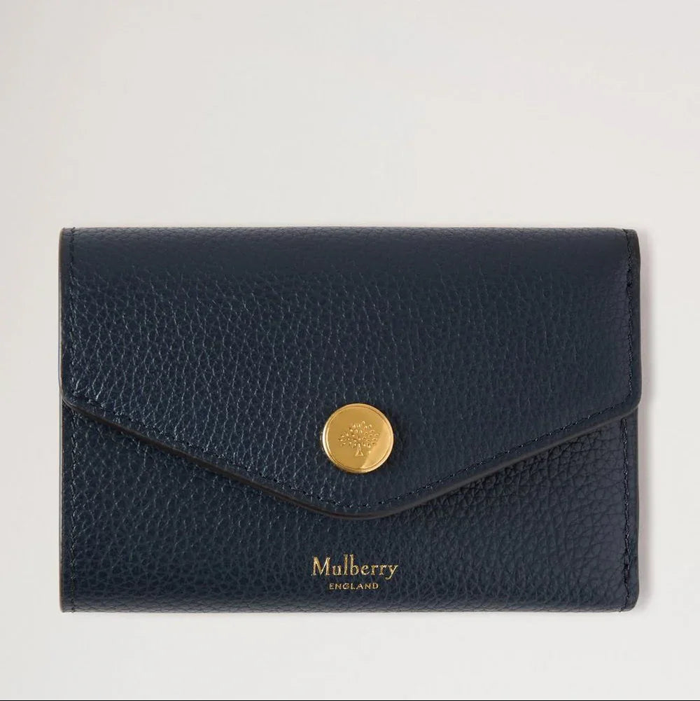 Mulberry Folded Multicard Wallet Night Sky seen from the front in dark blue leather with gold-coloured push button. Model rl6447205u888-1