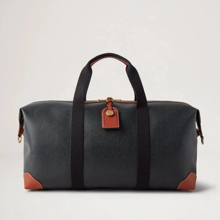 Mulberry Heritage Medium Clipper in black and cognac scotchgrain with leather details on the front. Model HL5136127A340