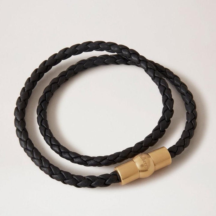 Mulberry Iris Unisex Woven Double Bracelet with black braided leather and gold magnetic clasp, Model QB2384657A100-001.