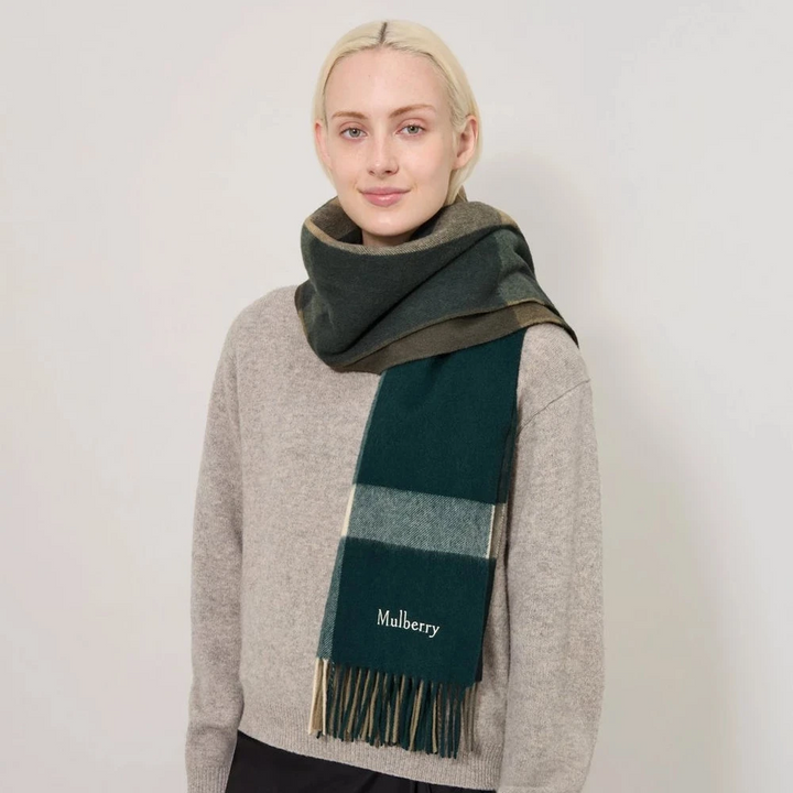 Mulberry Large Check Merino Wool Scarf, worn by woman, checkered green and beige wool. Model VS4295889Q750
