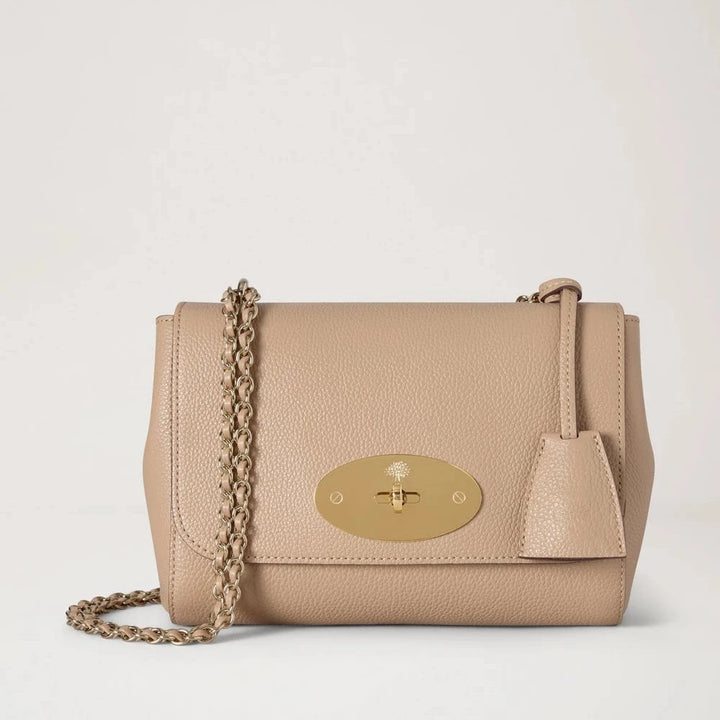 Mulberry Lily Crumpet Small Classic Grain shows a light beige leather bag with gold chain strap, Model HH3291205W577.