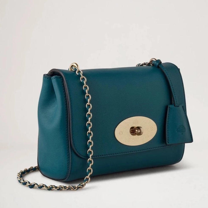 Mulberry Lily Micro Classic Grain Titanium Blue shoulder bag in blue leather with chain strap and gold buckle. Model HH9179587T622