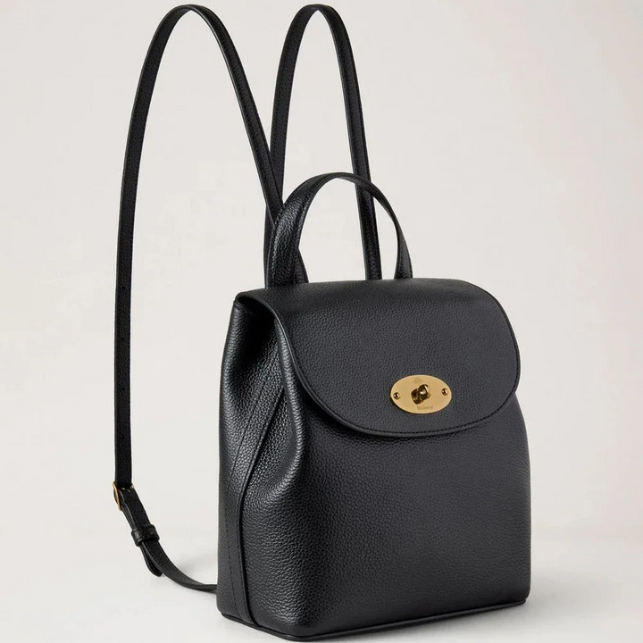 Mulberry Mini Bayswater Backpack Small Classic Grain Black shows an elegant black leather backpack with a gold-colored clasp. Model HH9829205A100