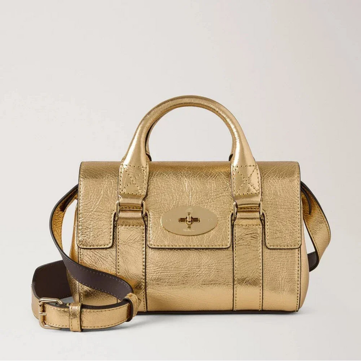 Mulberry Mini Heritage Bayswater Metallic Somerset Gold shows a Small Shoulder Strap Handbag in Shiny Gold, Model RL8918757Z098.