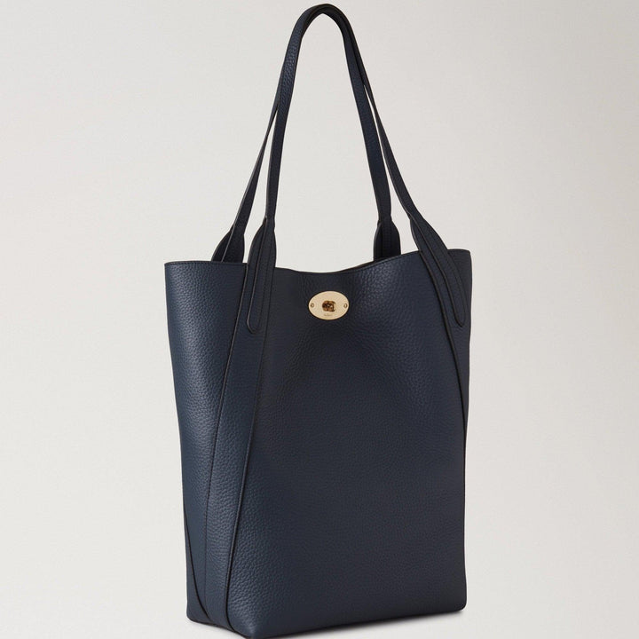 Mulberry North South Bayswater Night Sky shows off a dark blue leather bag with a golden buckle. Model HH9104736U888.