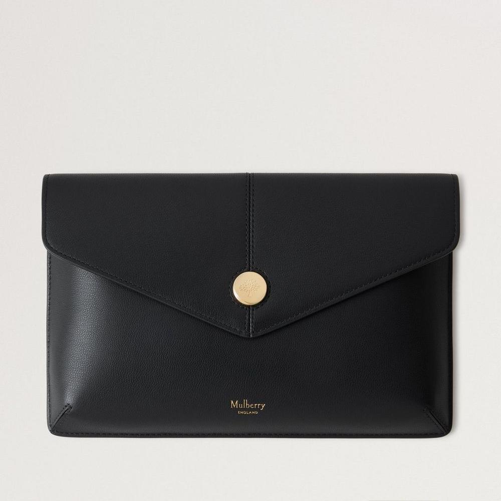 Mulberry Press Stud Envelope Pouch Black Micro Classic Grain shows a black envelope leather pouch with a gold-tone stud on the front. Model RL8707587A100.
