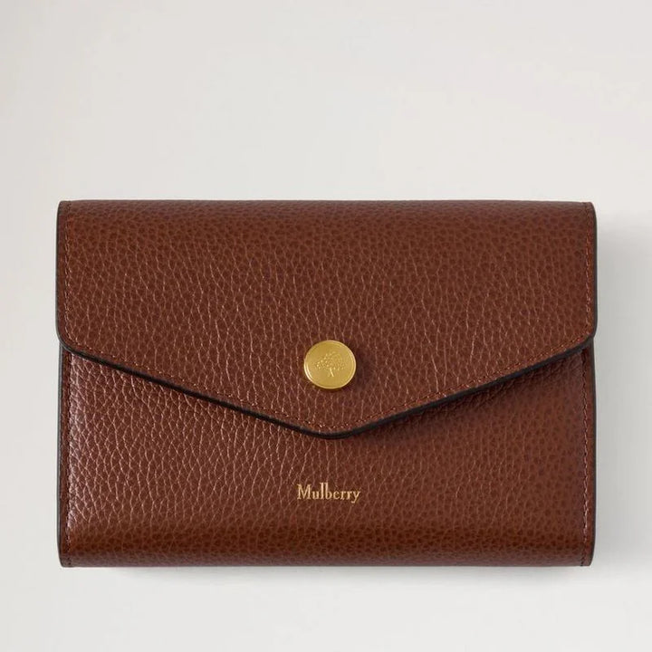 Mulberry Press Stud Wallet Oak Small Classic Grain, brown wallet in embossed leather with gold-colored button detail. Model RL9008552G110.