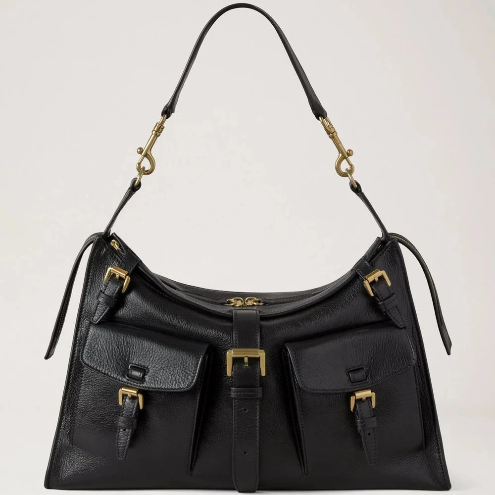 Mulberry Roxanne Shoulder Bag, high shine black leather with brass details, front view. Model hh9886213a100