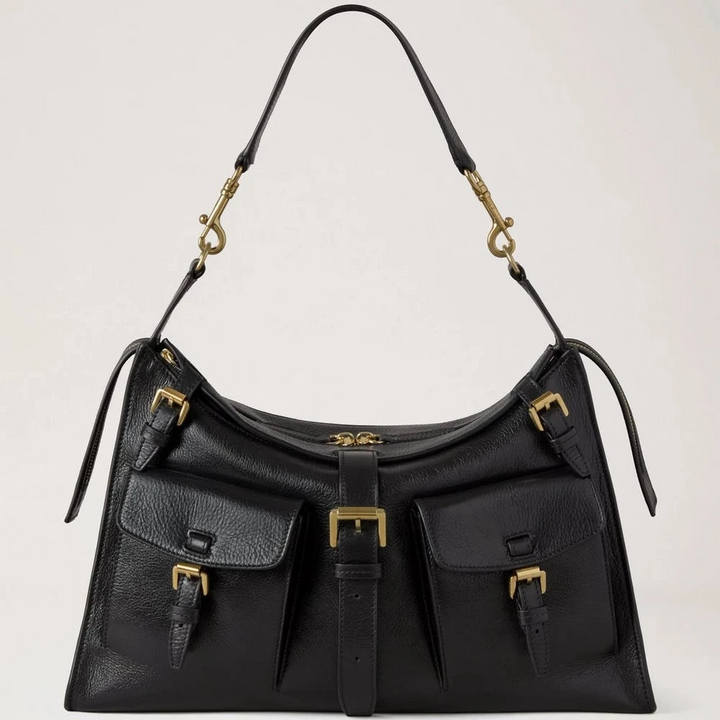 Mulberry Roxanne Shoulder Bag, high shine black leather with brass details, front view. Model hh9886213a100