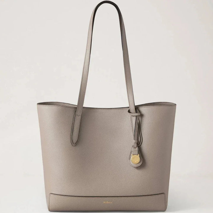Mulberry Shopper Cashmere Taupe Small Classic Grain shows a taupe colored leather bag with long handles. Model HH9833205F924.