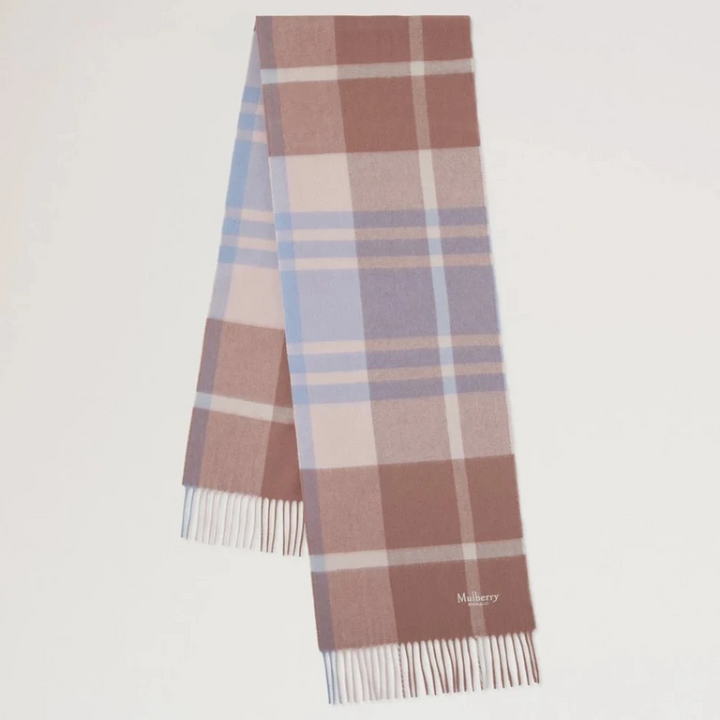 Mulberry Small Check Merino Wool Scarf shows a scarf in pink and blue checks with white fringes. Model VS4319890J646.