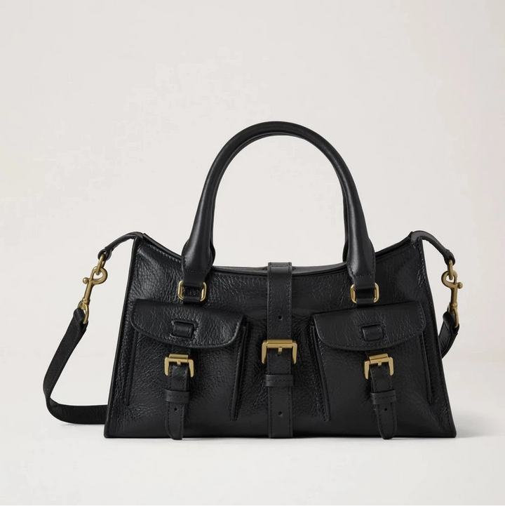 Mulberry Small Roxanne High Shine Leather Black shows a black leather bag with gold colored buckles, Model HH9977213A100.