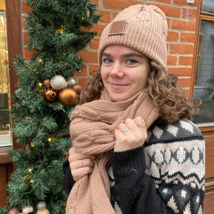 Mulberry Softie Chain Cable Beanie in maple shown on woman outdoors, knitted look, Model VH4122996E631