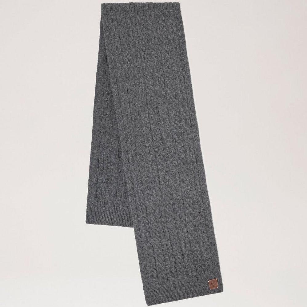 Mulberry Softie Chain Cable Knit Scarf in charcoal is seen flat, knitted in a soft cable pattern. Model VS4760969C110.