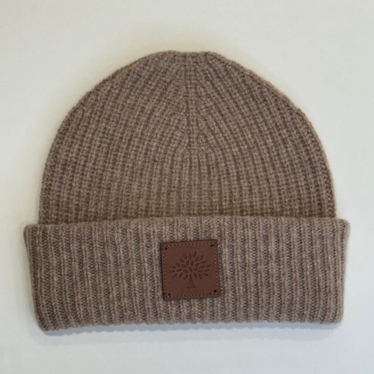 Mulberry Solid Wool Beanie features a ribbed brown wool beanie with leather logo patch, Model VH4162163E631.