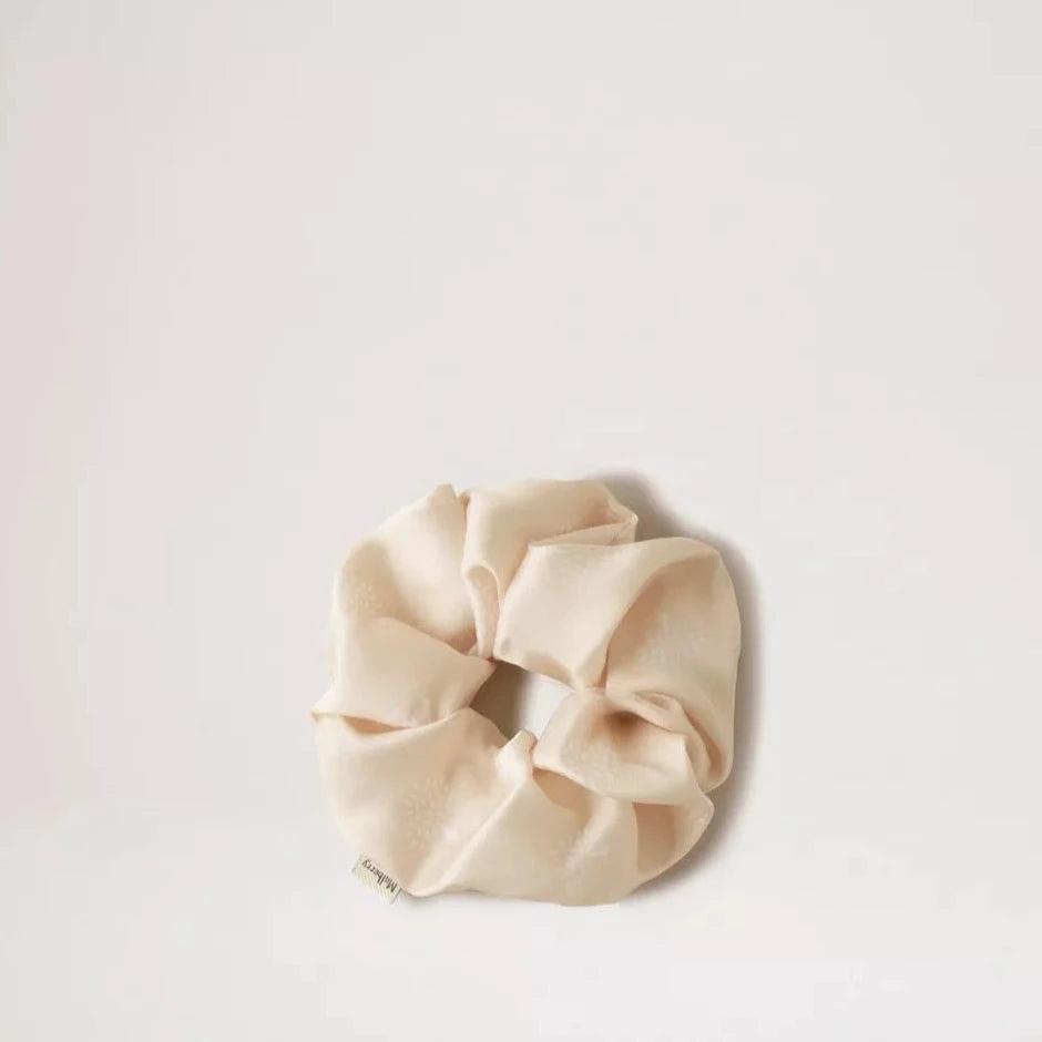 Mulberry Tree Hair Scrunchie Cream in light beige satin look, simple and elegant on a neutral background. Model VA0009948H130