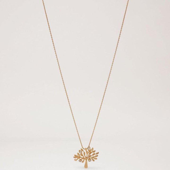 Mulberry Tree Necklace brass necklace with tree pendant in golden brass on light background Model qn2258000n637