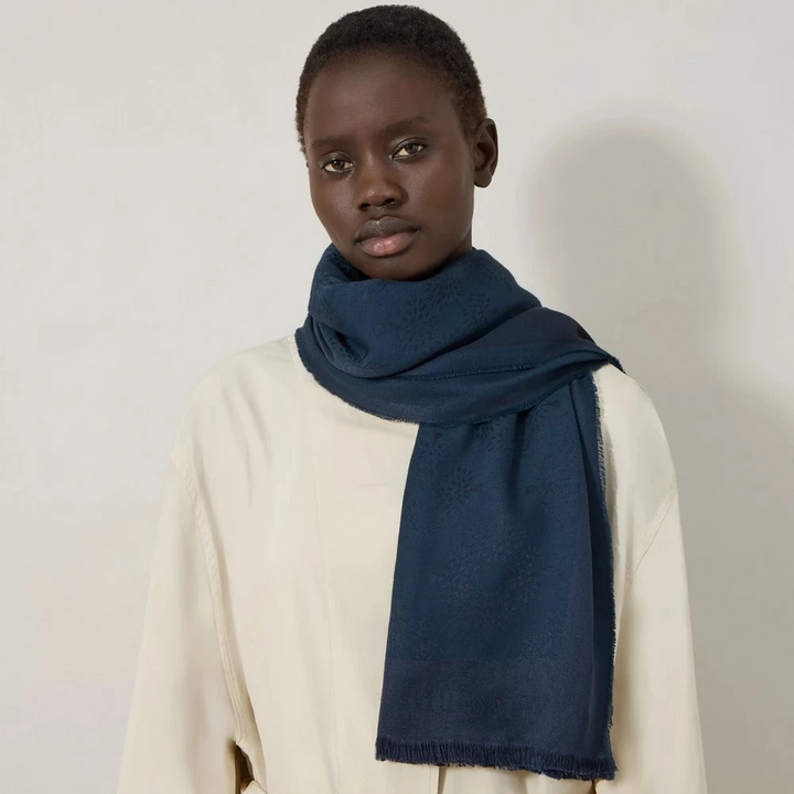 Mulberry Tree Square Night Sky Cotton Silk Blend shows a dark blue cotton-silk scarf worn by model. Model vs4639709u888
