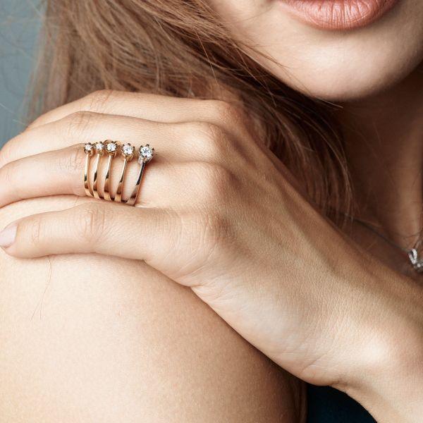 Nuran Star Ring 14kt white gold 0.03ct W/SI displayed on woman's hand, elegant diamond look. Model l1964-003hg-001.