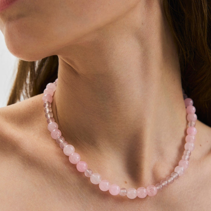 Pernille Corydon Blush gold plated necklace with rose quartz worn by model, pearls in pink shade. Model N-526-GP