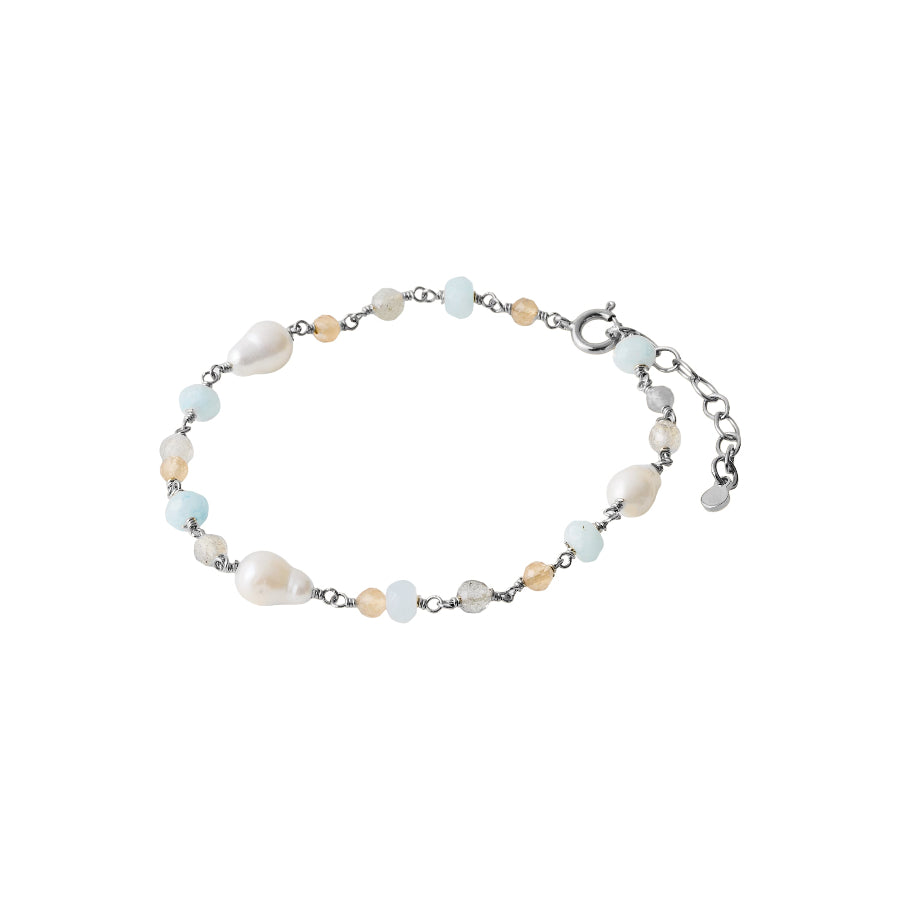 Pernille Corydon Mellow Blue Bracelet with blue, white and beige pearls in silver. Model B-375-S.