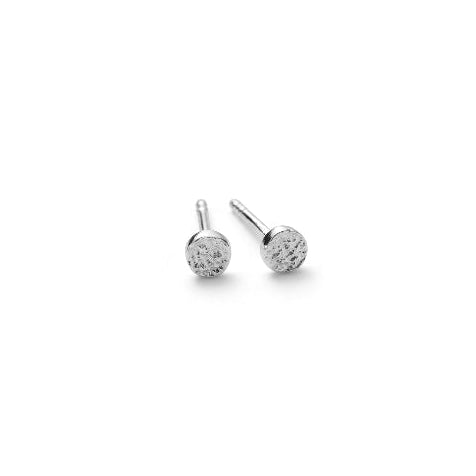 Pernille Corydon Micro Nature Studs in silver shown as simple, small round studs. Model E-390-S-1.