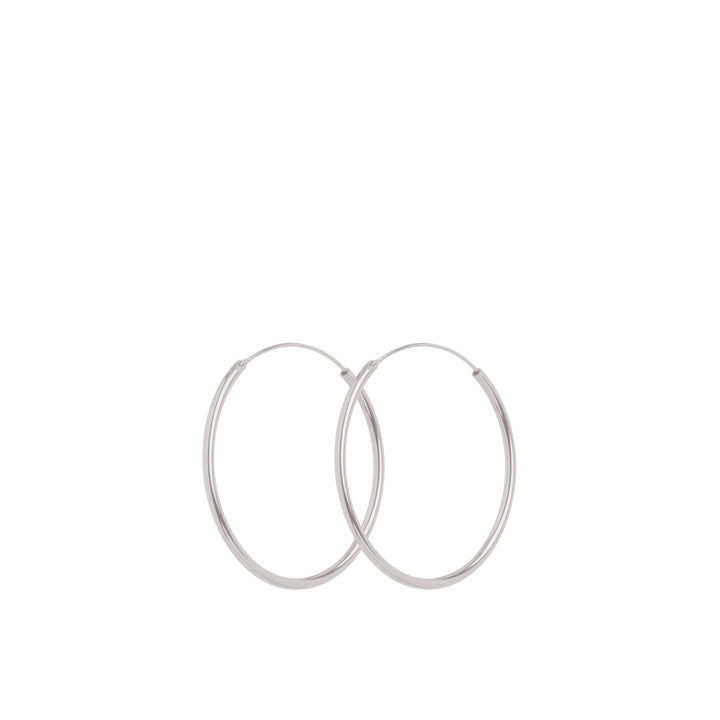 Pernille Corydon Mini Plain Hoops in silver, simple round earrings in classic design. Model E-139-S.