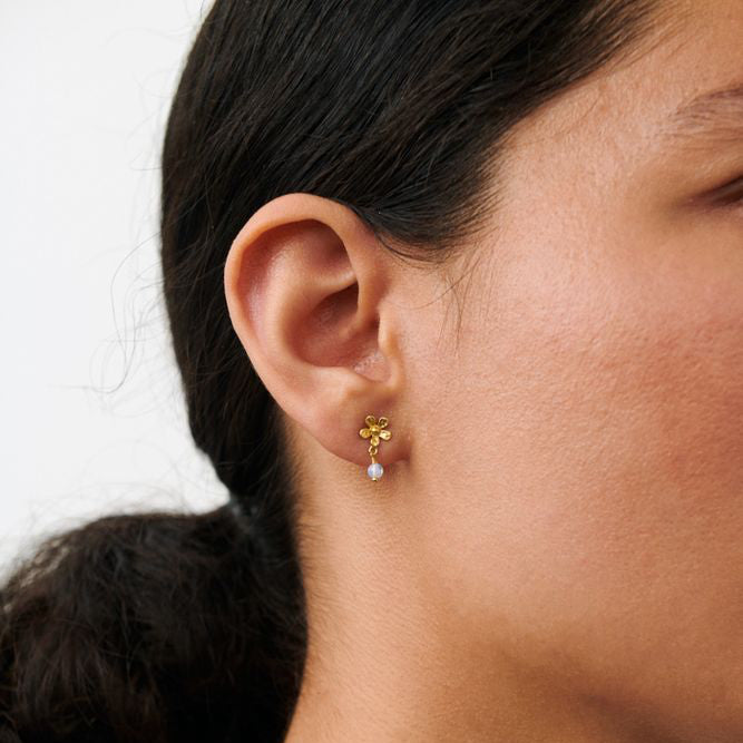 Pernille Corydon Moonstone Poppy earrings in gold-plated silver with flower detail and white stone, Model E-370-GP