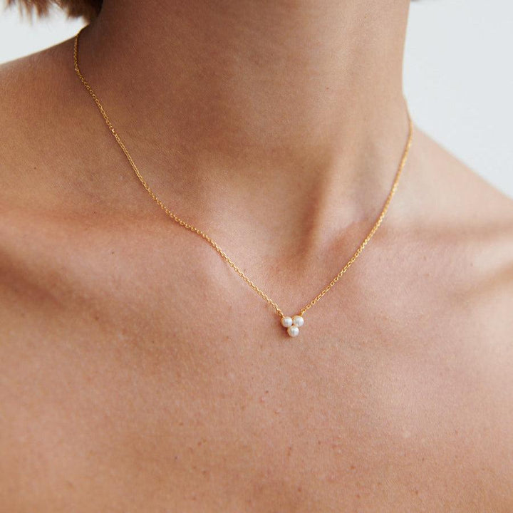 Pernille Corydon Ocean Bay gold-plated pearl necklace with small white pearls on model. Model N-442-GP-1