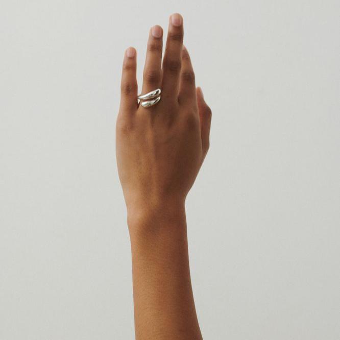 Pernille Corydon Rain Silver Ring worn on one hand, elegant glossy surface, Model R-304-S-001.