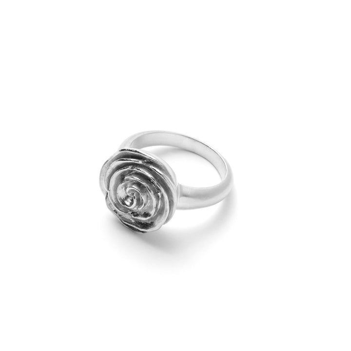 Pernille Corydon Rose Ring in silver with the detail of the rose seen from the front on a white background. Model R-537-S-001.