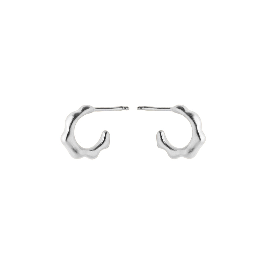 Pernille Corydon Small Aqua Hoops silver earrings with a wavy surface in a minimalist design. Model E-148-S-1.