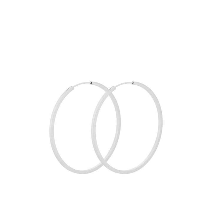 Pernille Corydon Small Orbit Hoops in silver, two simple hoops in minimalist style. Model E-052-S-1.