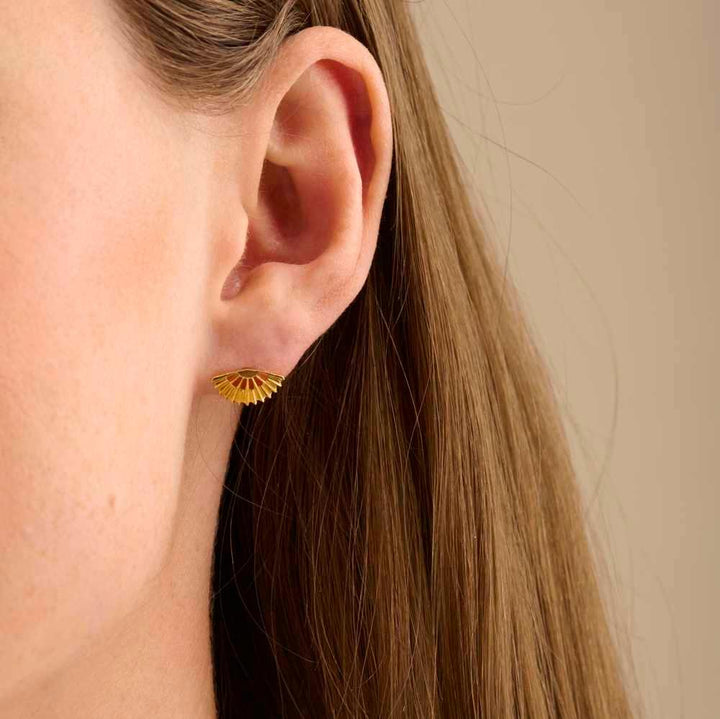 Pernille Corydon Sphere earrings in gold-plated silver shown on ear, elegant fan-shaped design. Model E-493-GP