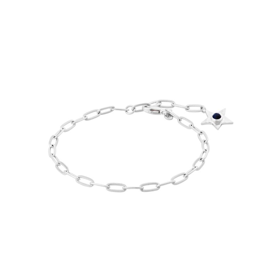 Pernille Corydon Twinkling Star bracelet in silver with star pendant and dark stone, elegant chain look. Model B-382-S